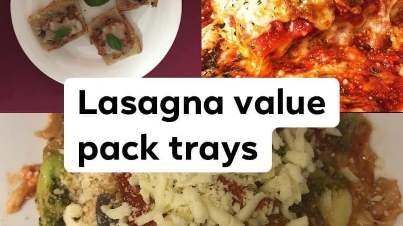A plate of lasagna with some type of sauce.